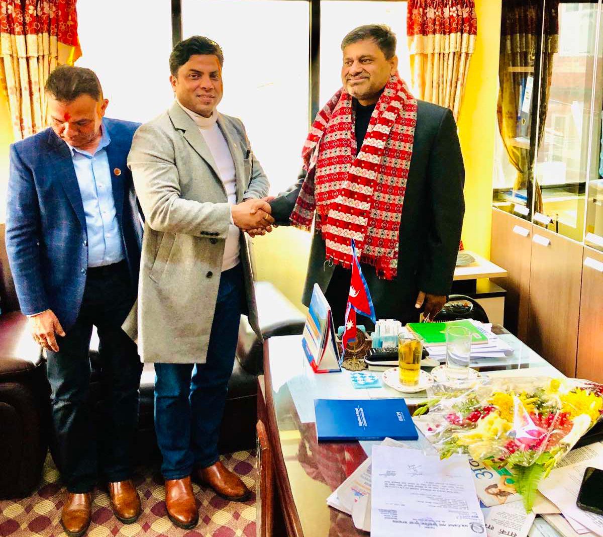 With Nepal government Person
